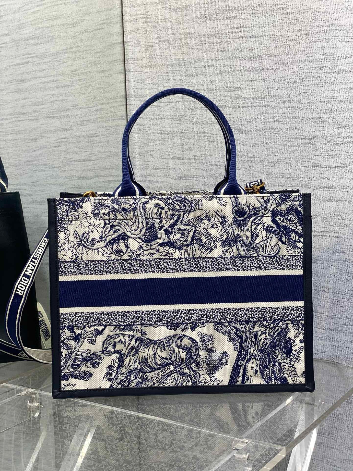 D*or medium book tote bag with strap in blue toile de jouy sauvage embroidery
