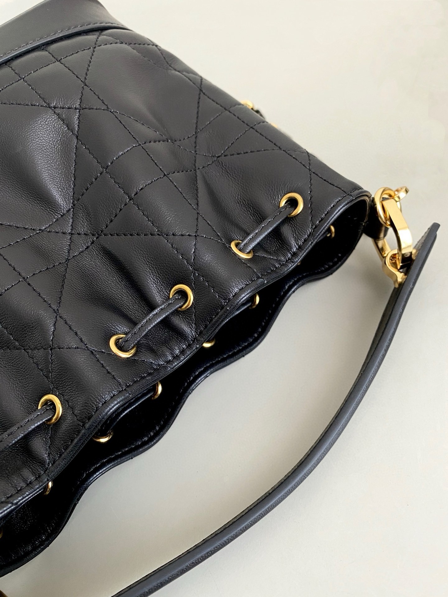D*or small jolie bucket bag in black macrocannage lambskin