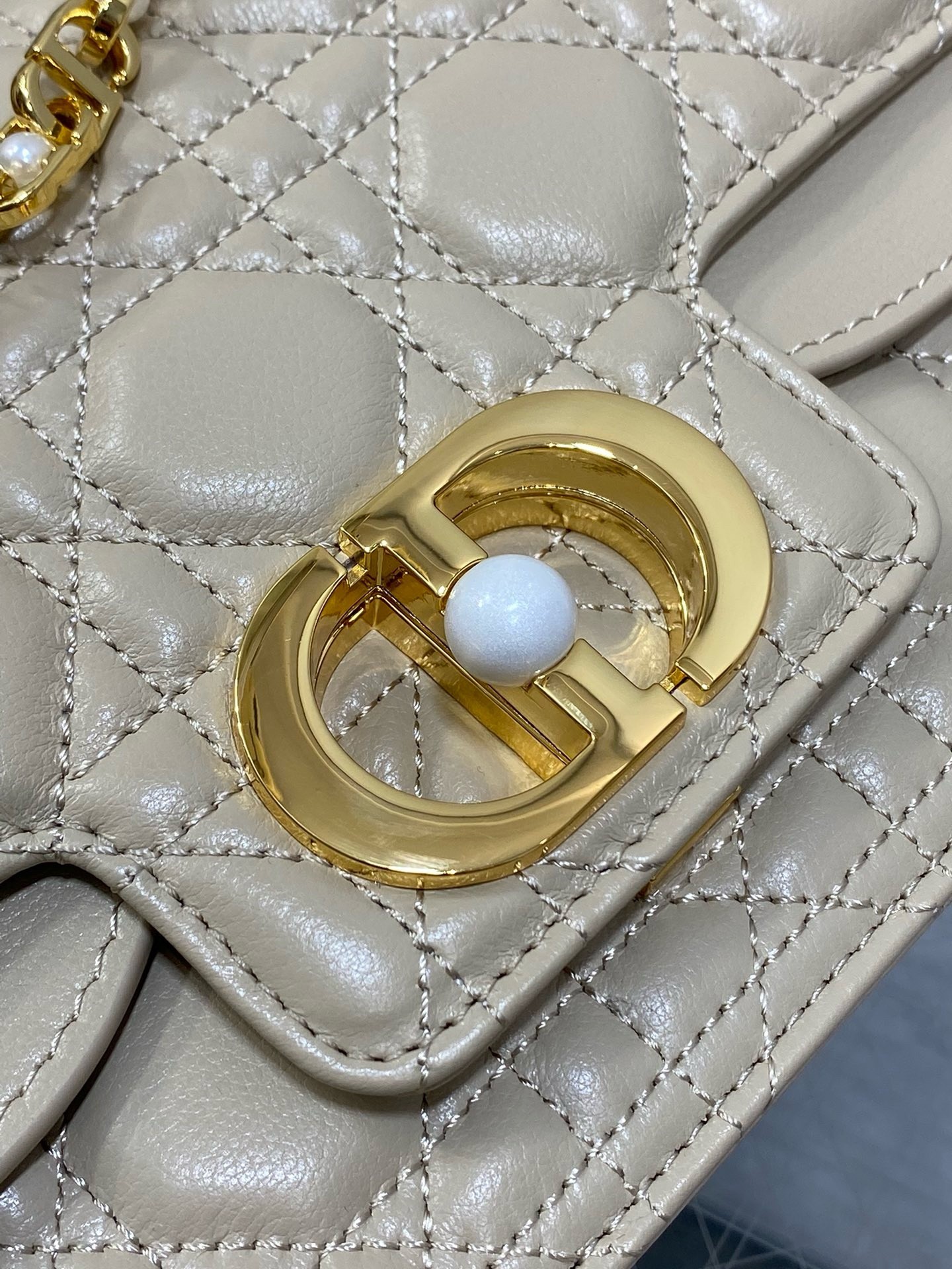 D*or small jolie top handle bag in beige cannage calfskin