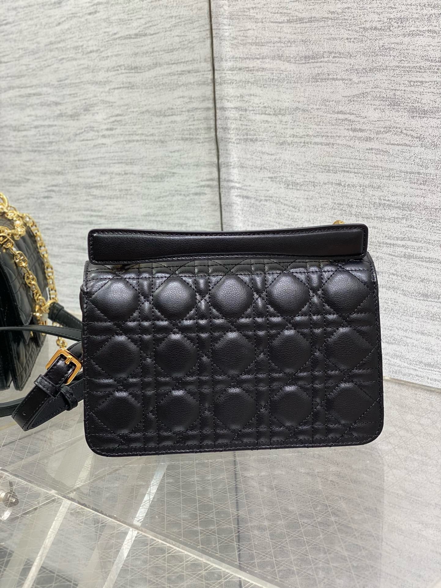 D*or small jolie top handle bag in black cannage calfskin