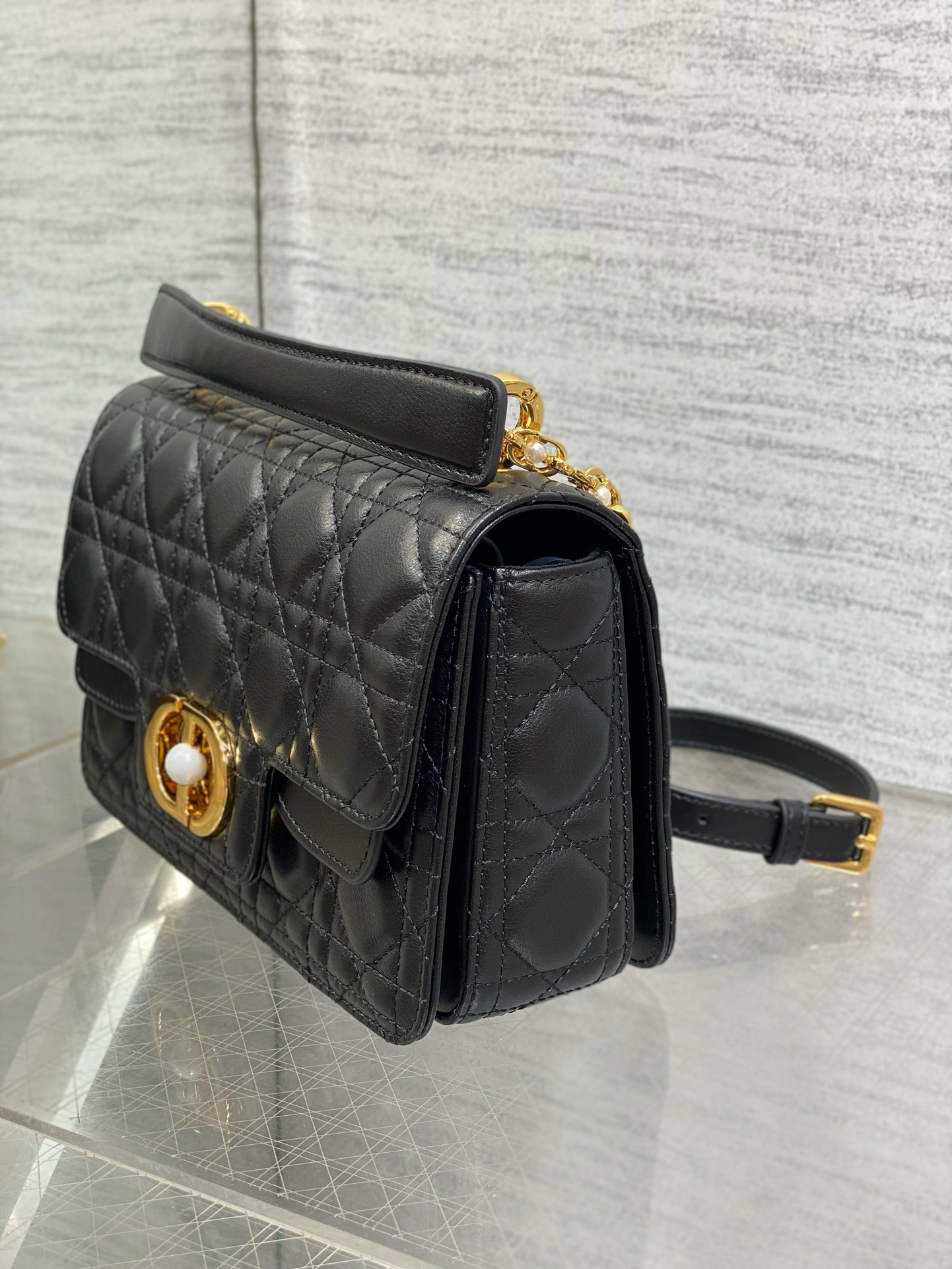 D*or small jolie top handle bag in black cannage calfskin