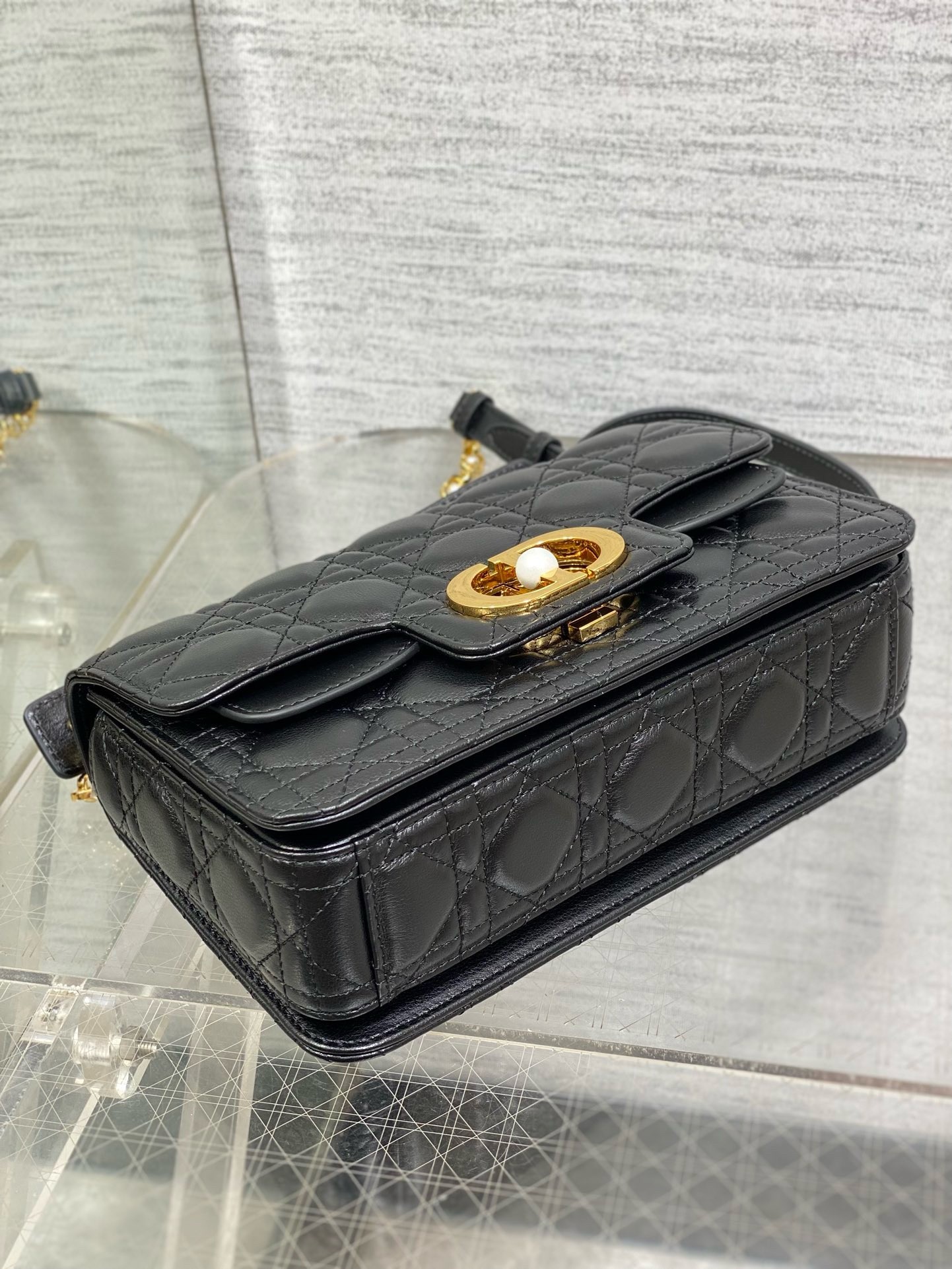 D*or small jolie top handle bag in black cannage calfskin