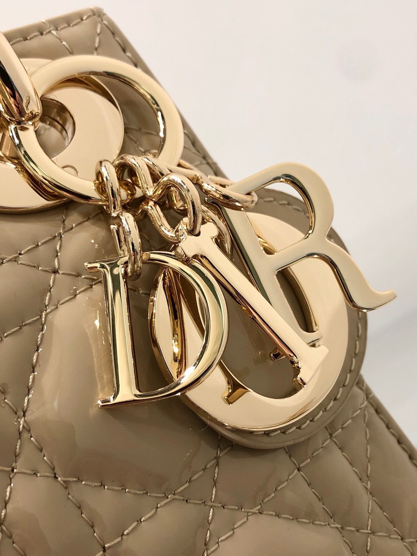 D*or lady D*or mini chain bag with chain in aesthetic beige patent calfskin