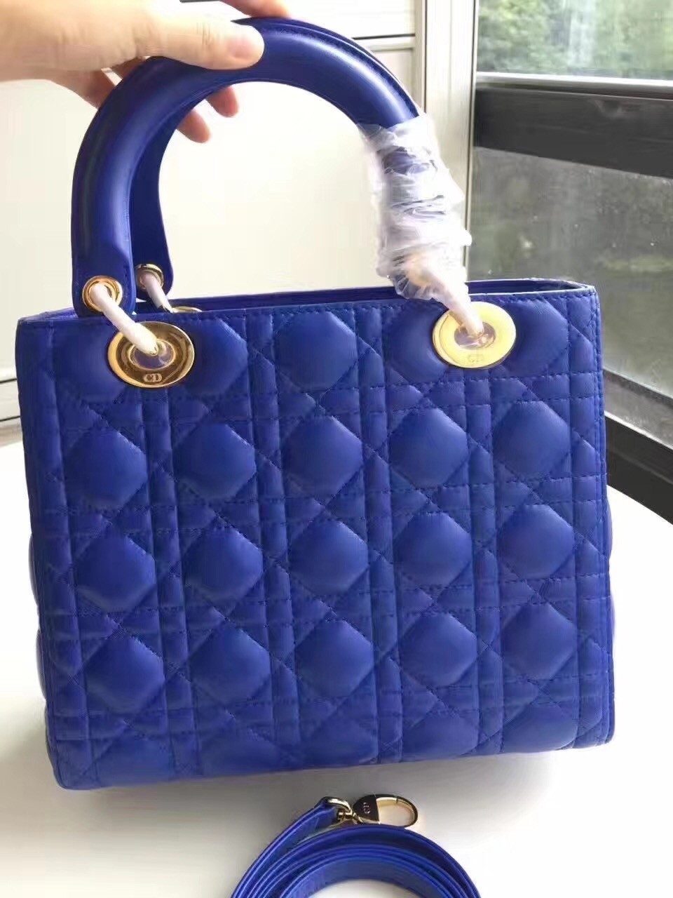 D*or medium lady D*or bag in blue lambskin
