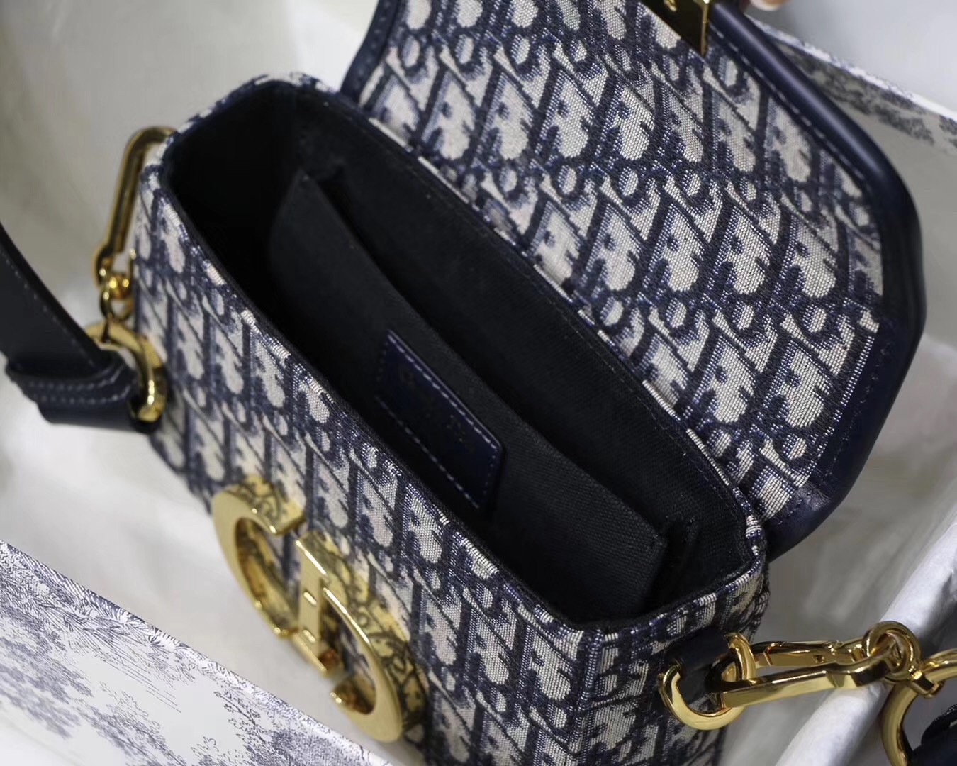 D*or 30 montaigne box bag in blue oblique canvas