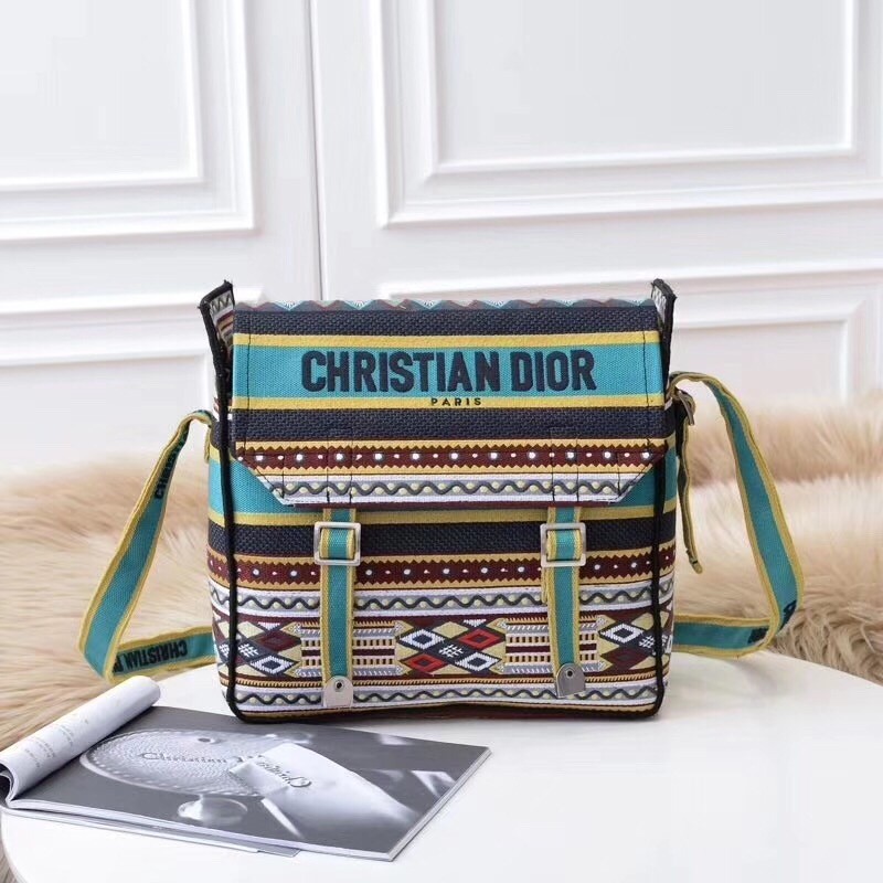 D*or D*orcamp messenger bag in turquoise embroidered canvas