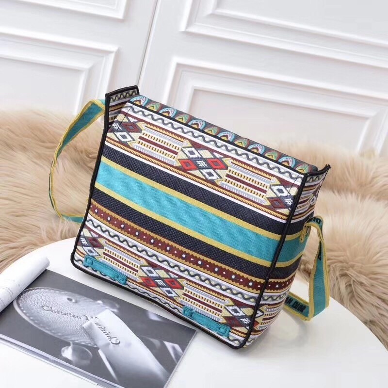 D*or D*orcamp messenger bag in turquoise embroidered canvas