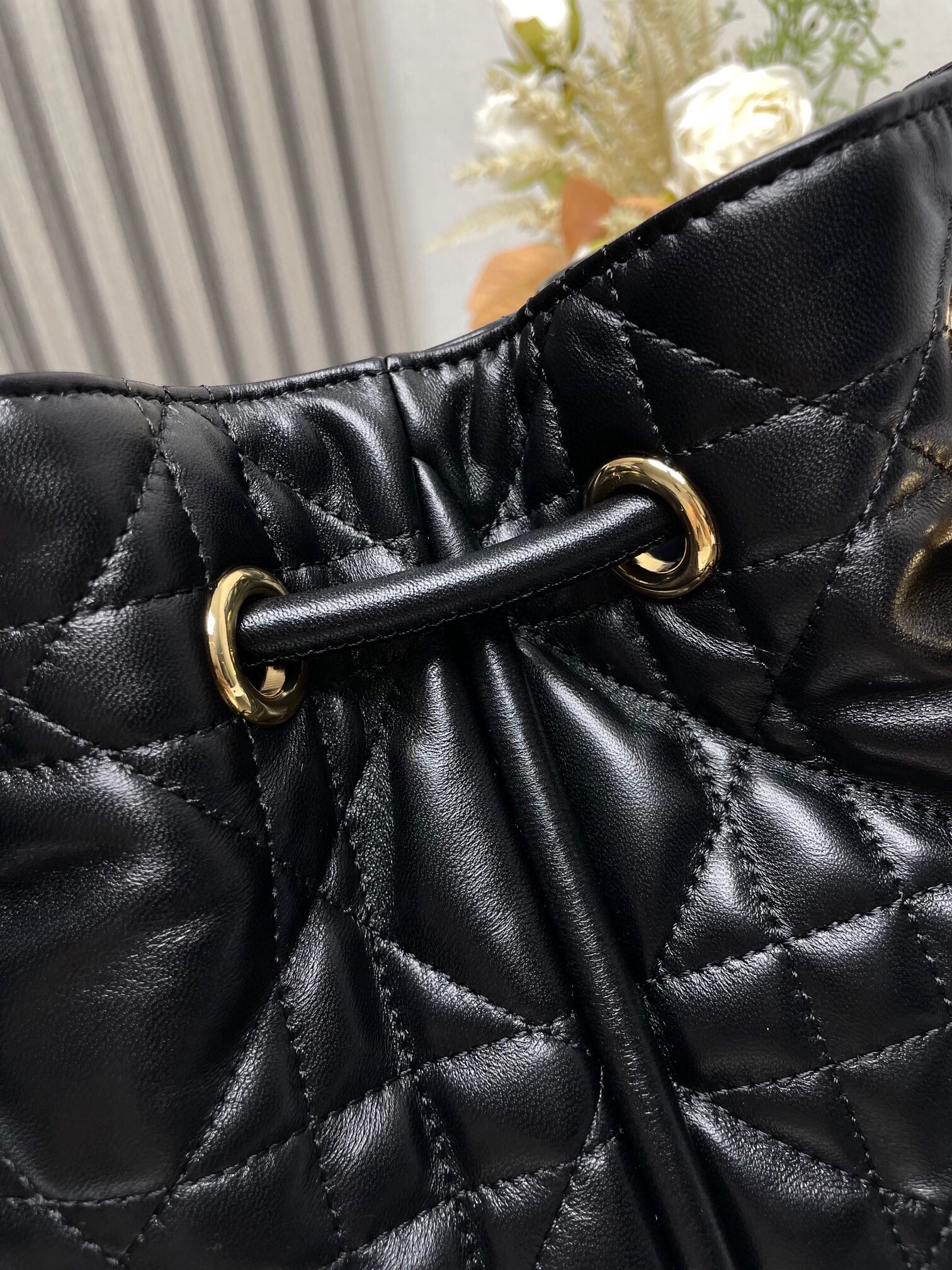 D*or nolita medium bag in black macrocannage lambskin