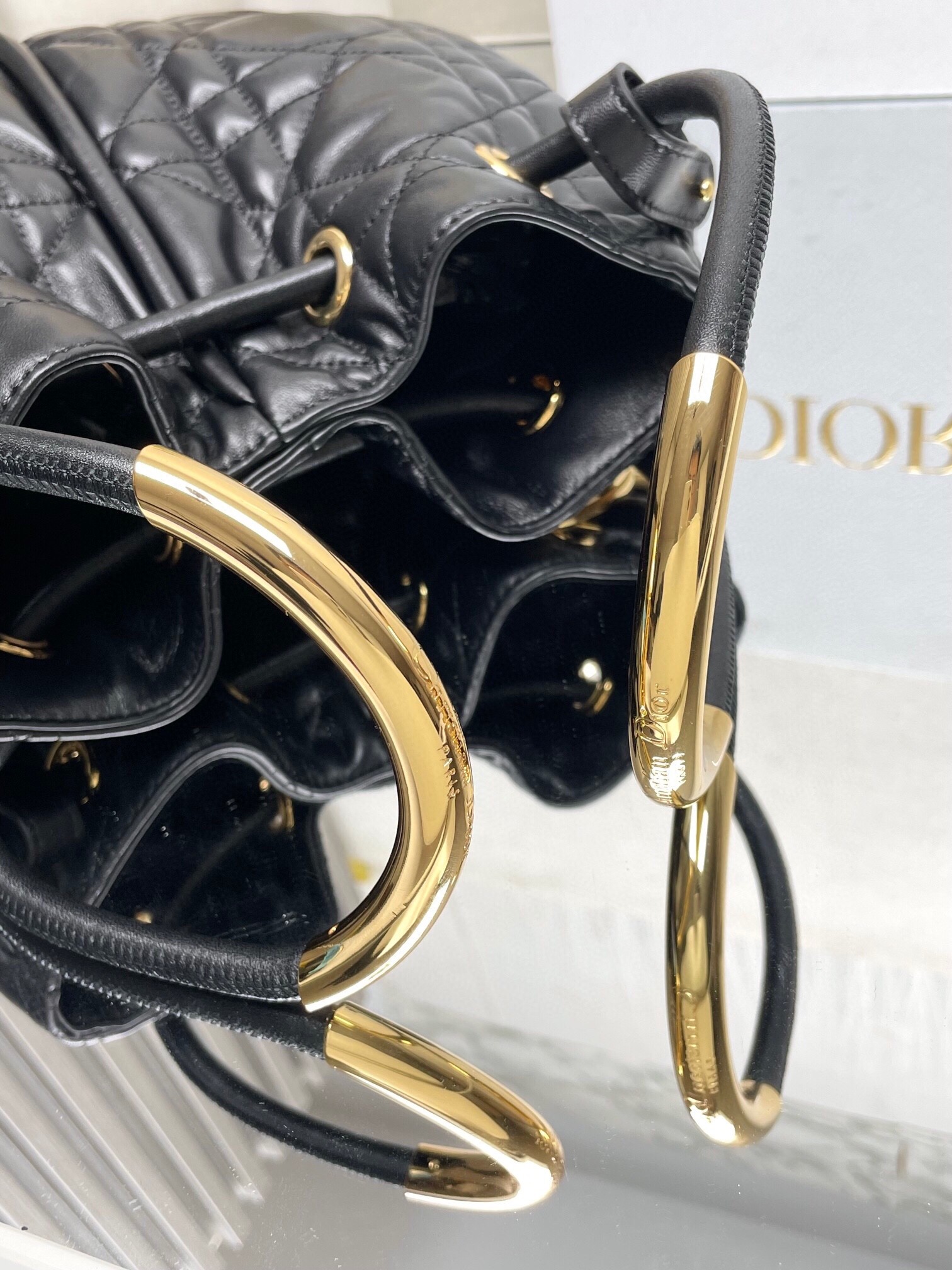D*or nolita medium bag in black macrocannage lambskin