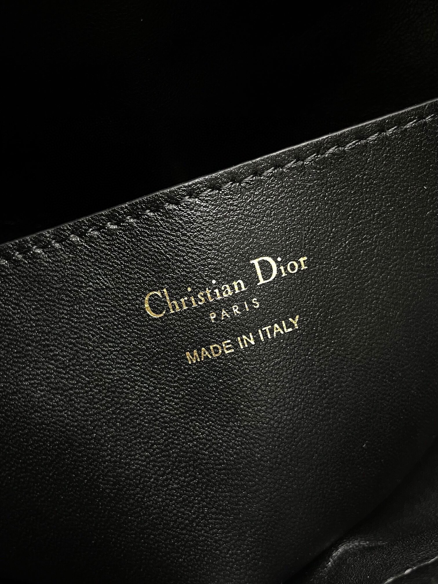 D*or nolita medium bag in black macrocannage lambskin