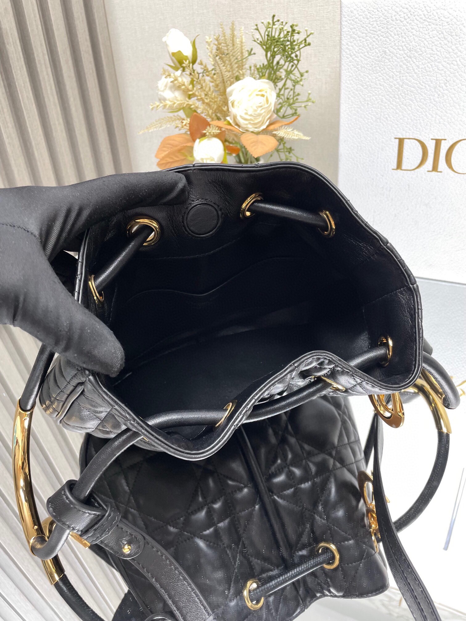 D*or nolita medium bag in black macrocannage lambskin