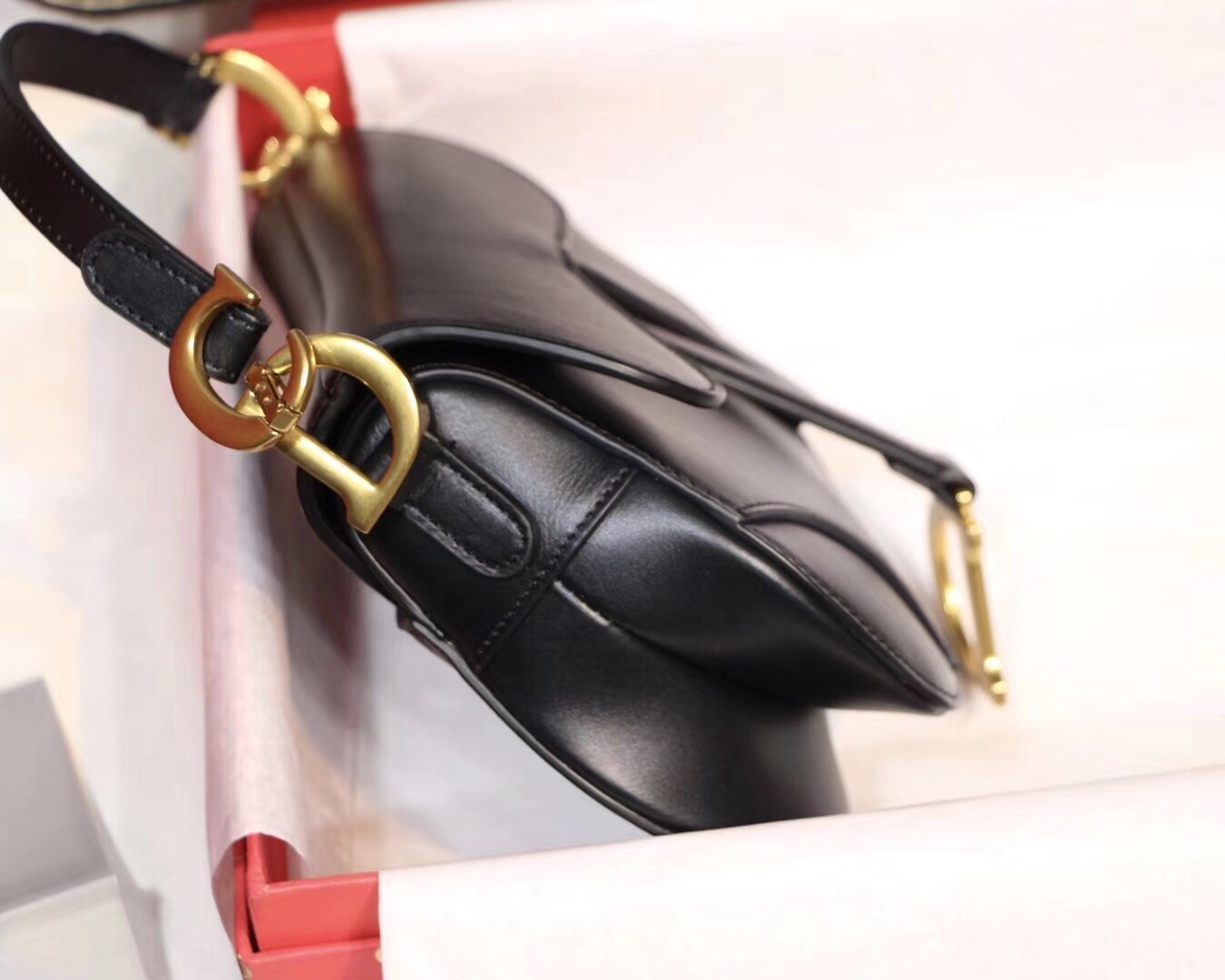 D*or mini saddle bag in black calfskin