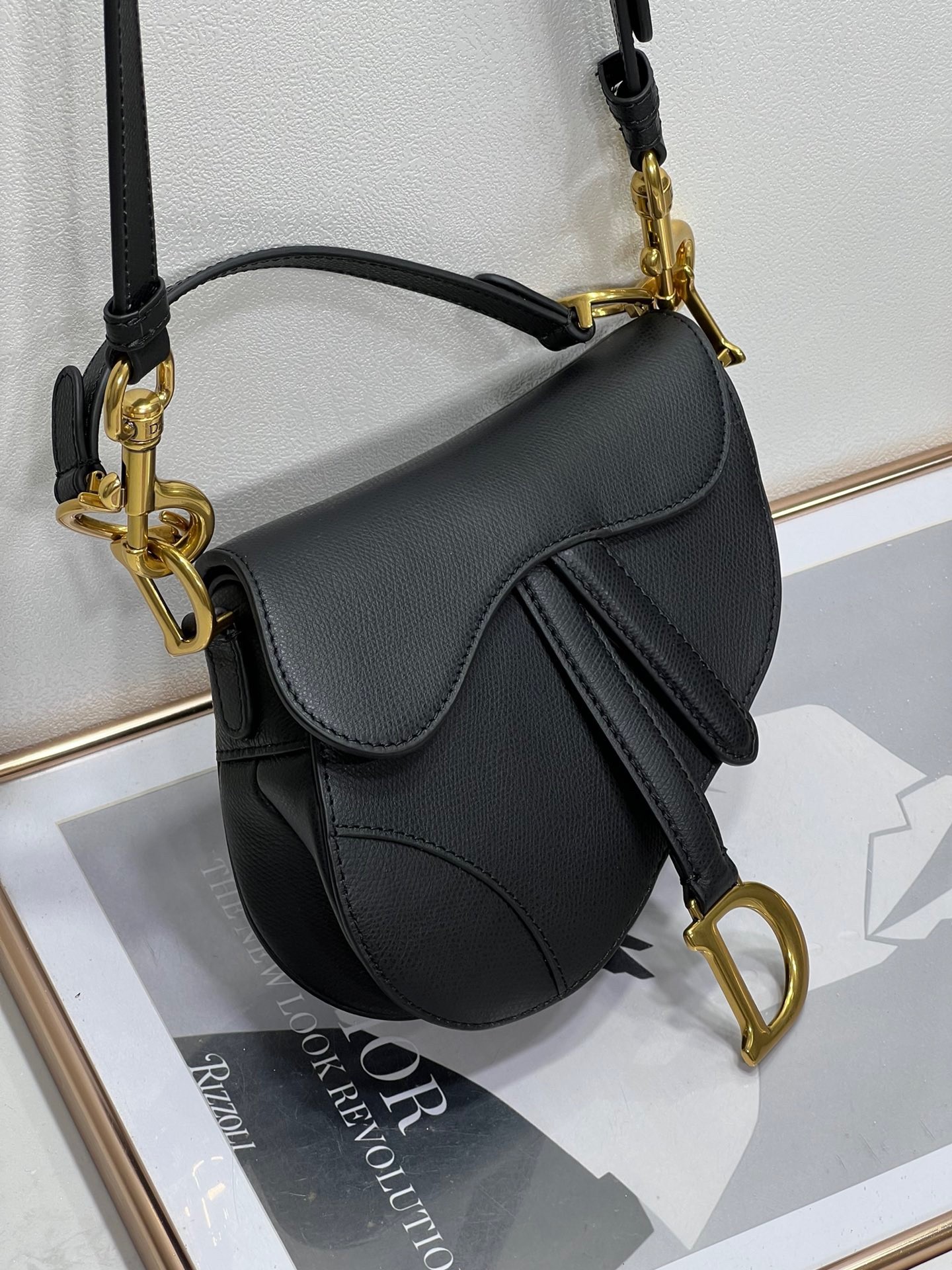 D*or saddle mini bag with strap in black grained calfskin