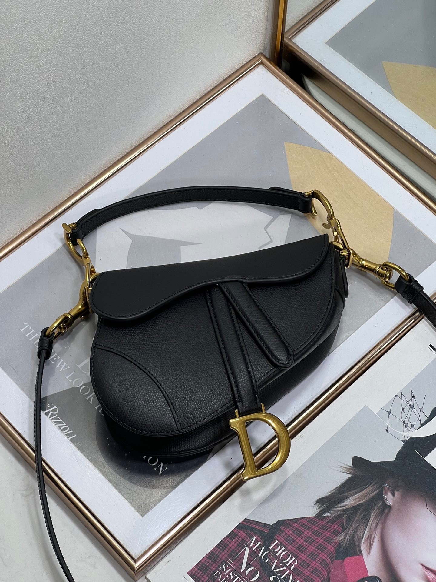 D*or saddle mini bag with strap in black grained calfskin