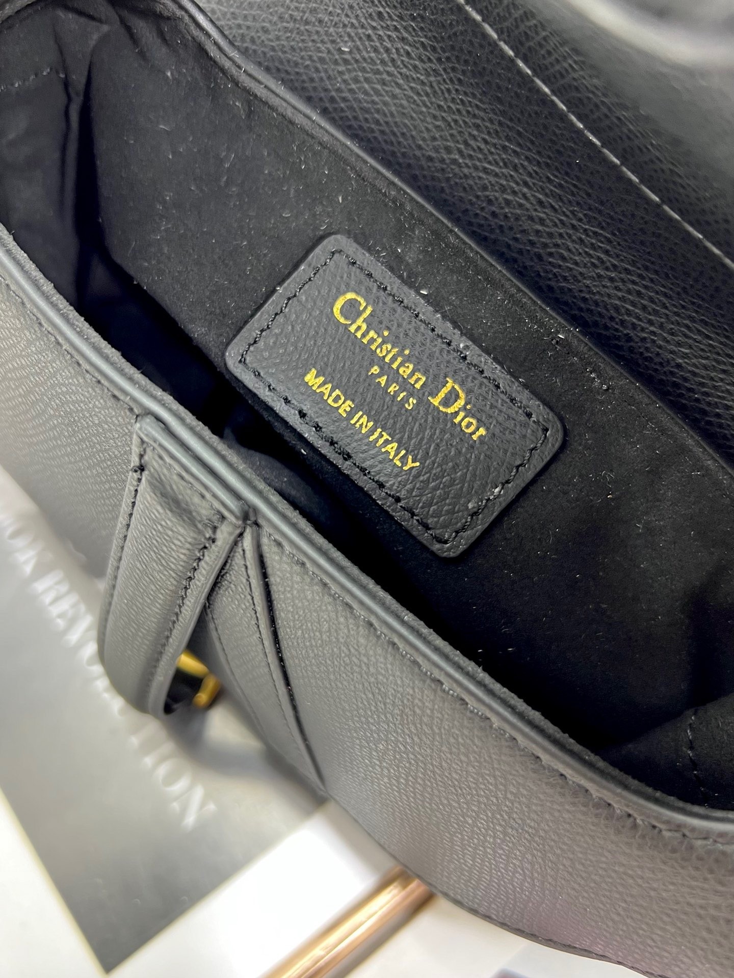 D*or saddle mini bag with strap in black grained calfskin