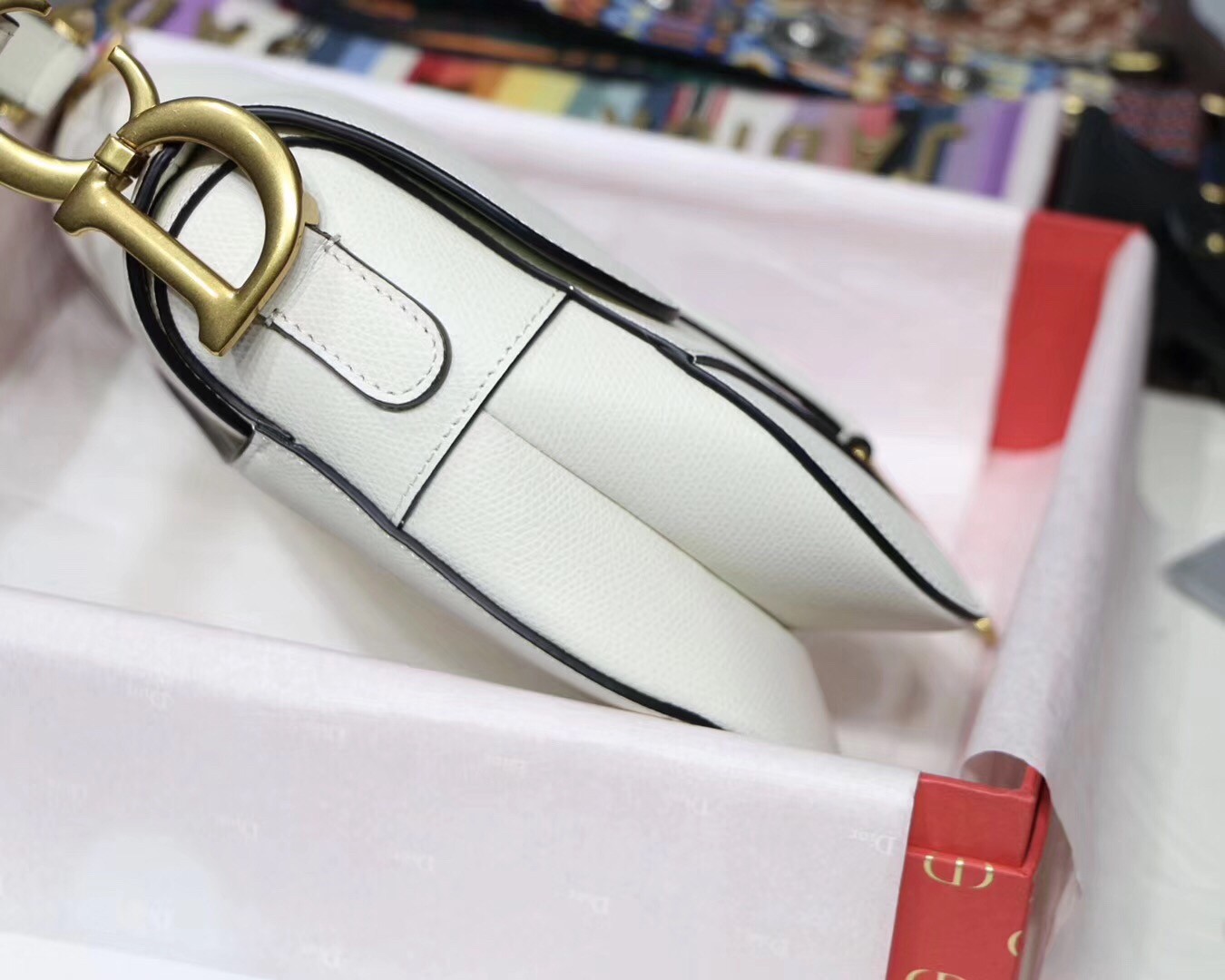 D*or saddle bag in white grained calfskin