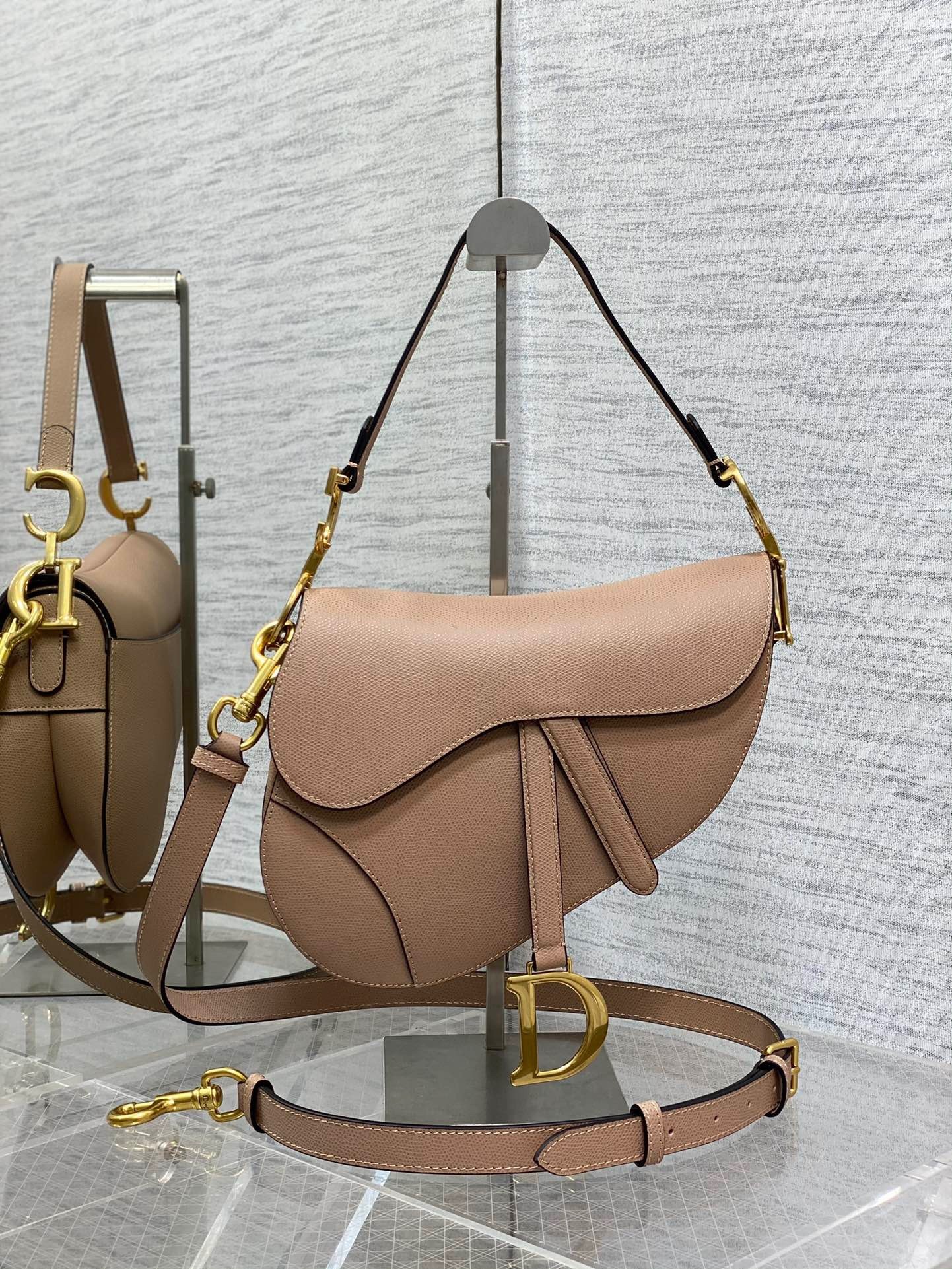 D*or saddle bag with strap in blush grained calfskin