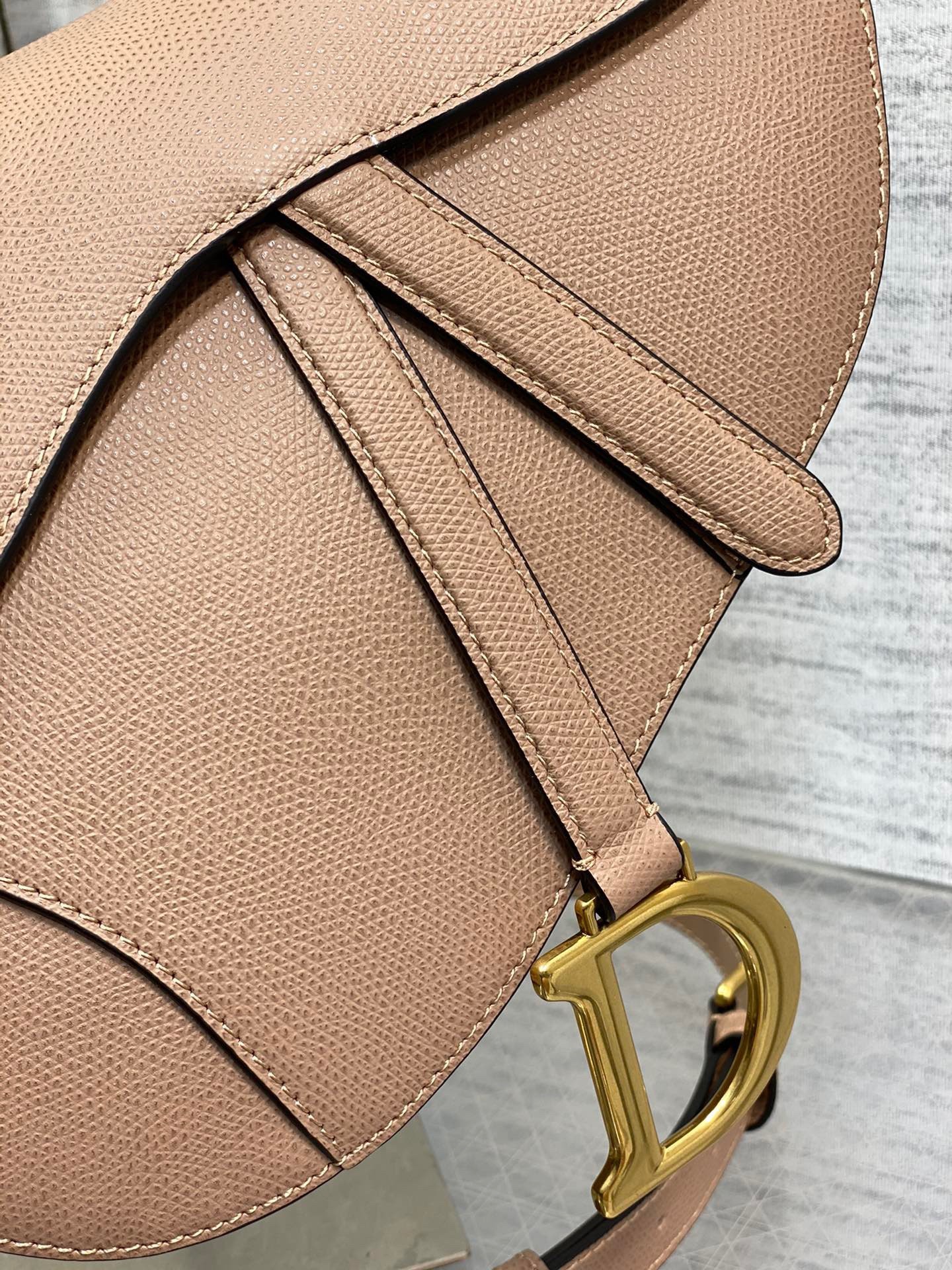 D*or saddle bag with strap in blush grained calfskin
