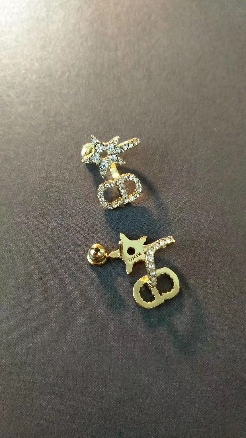 D*or clair d lune earrings in gold-finish metal and white crystals