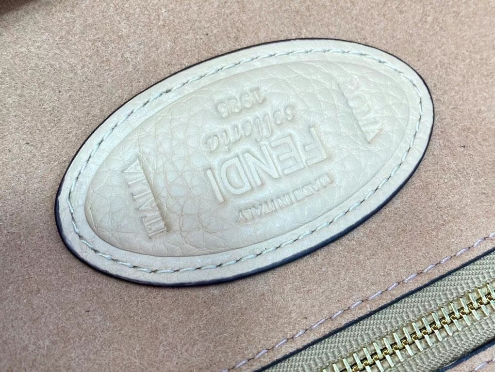 F**di medium baguette bag in beige shearling