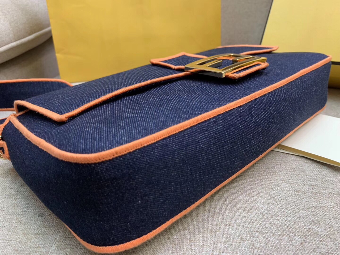 F**di large baguette bag in blue denim with orange trim