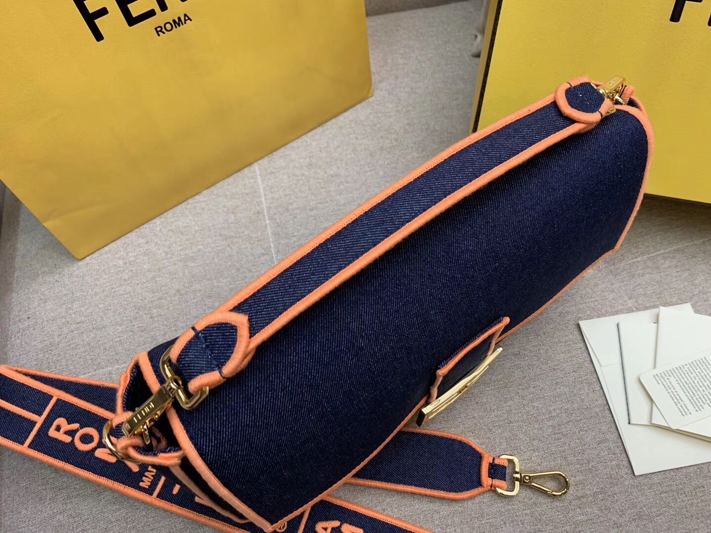 F**di large baguette bag in blue denim with orange trim