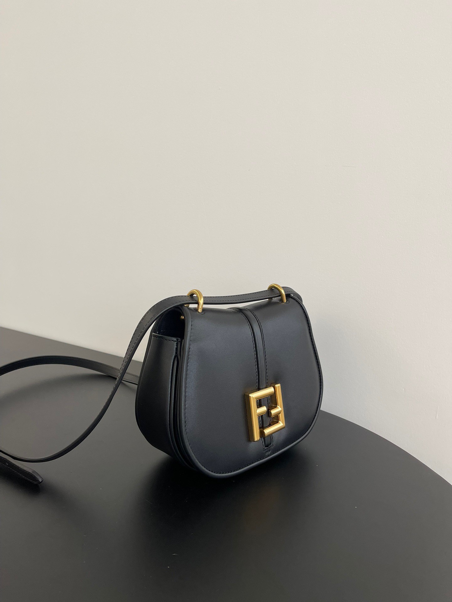 F**di c’mon small bag in black calfskin