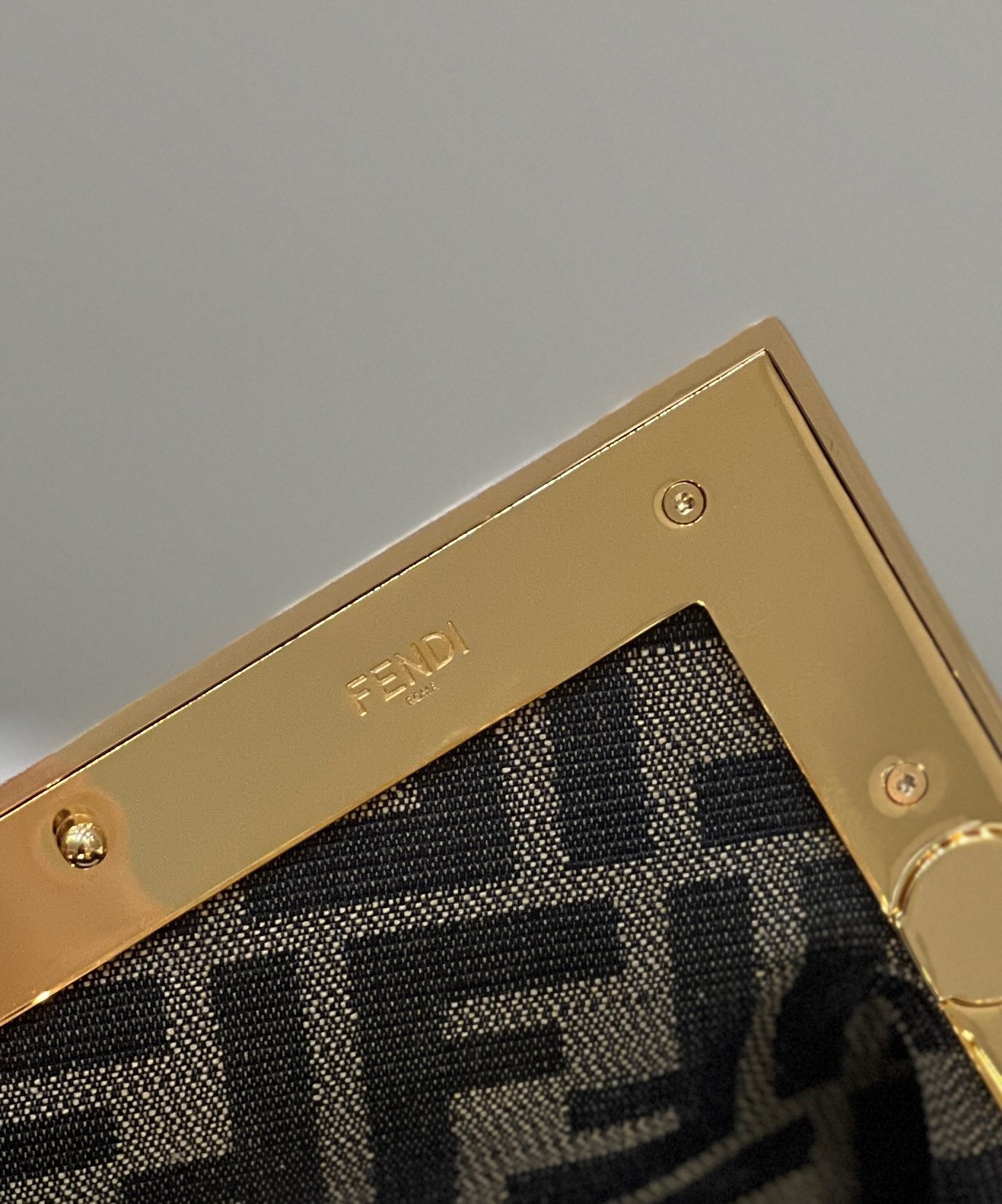 F**di first small bag in gold laminated leather