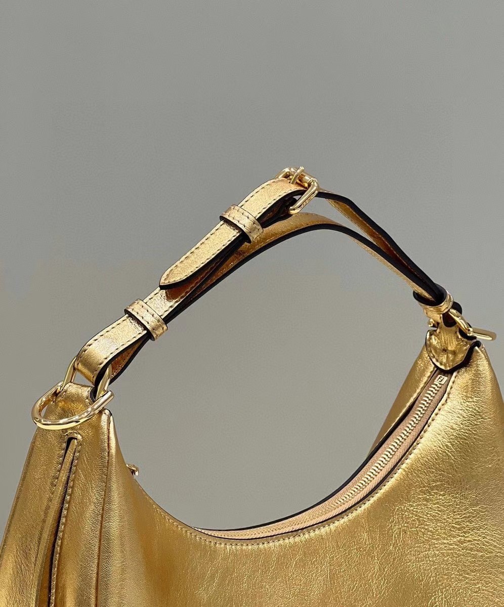 F**di F**digraphy small hobo bag in gold laminated leather