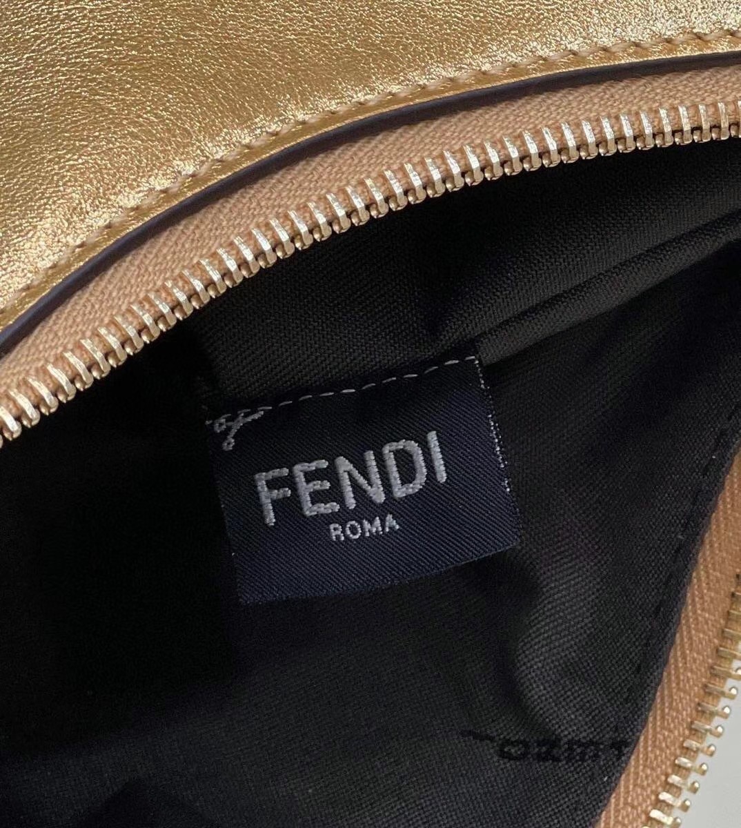 F**di F**digraphy small hobo bag in gold laminated leather