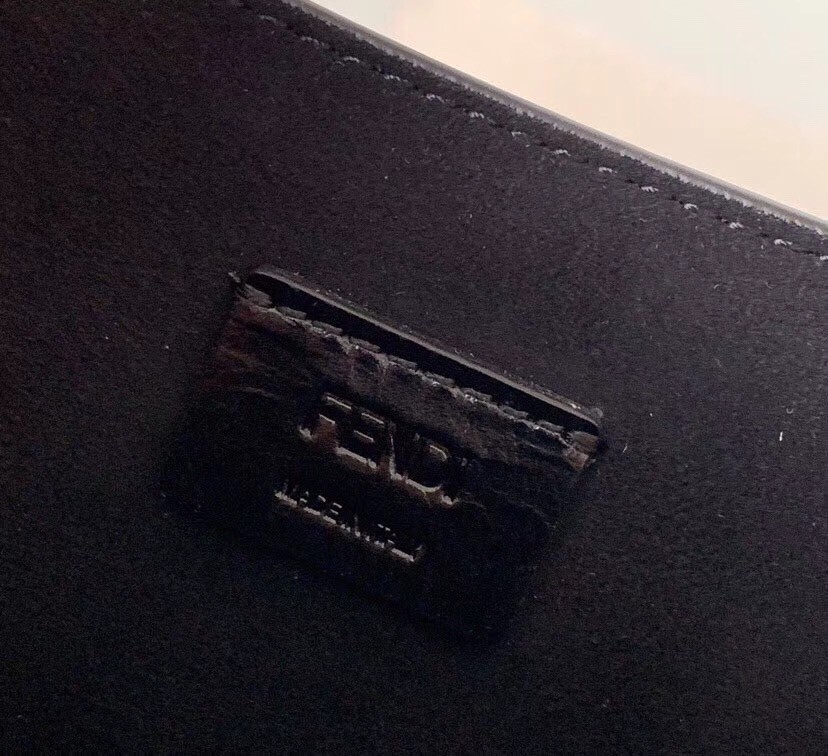 F**di karligraphy bag in black patent leather