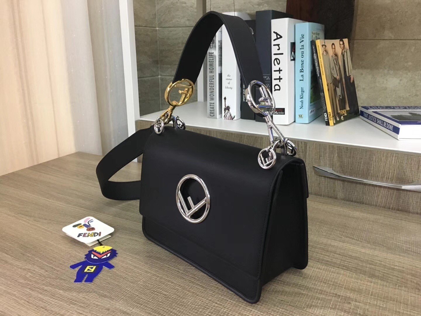 F**di kan i f shoulder bag in black calfskin