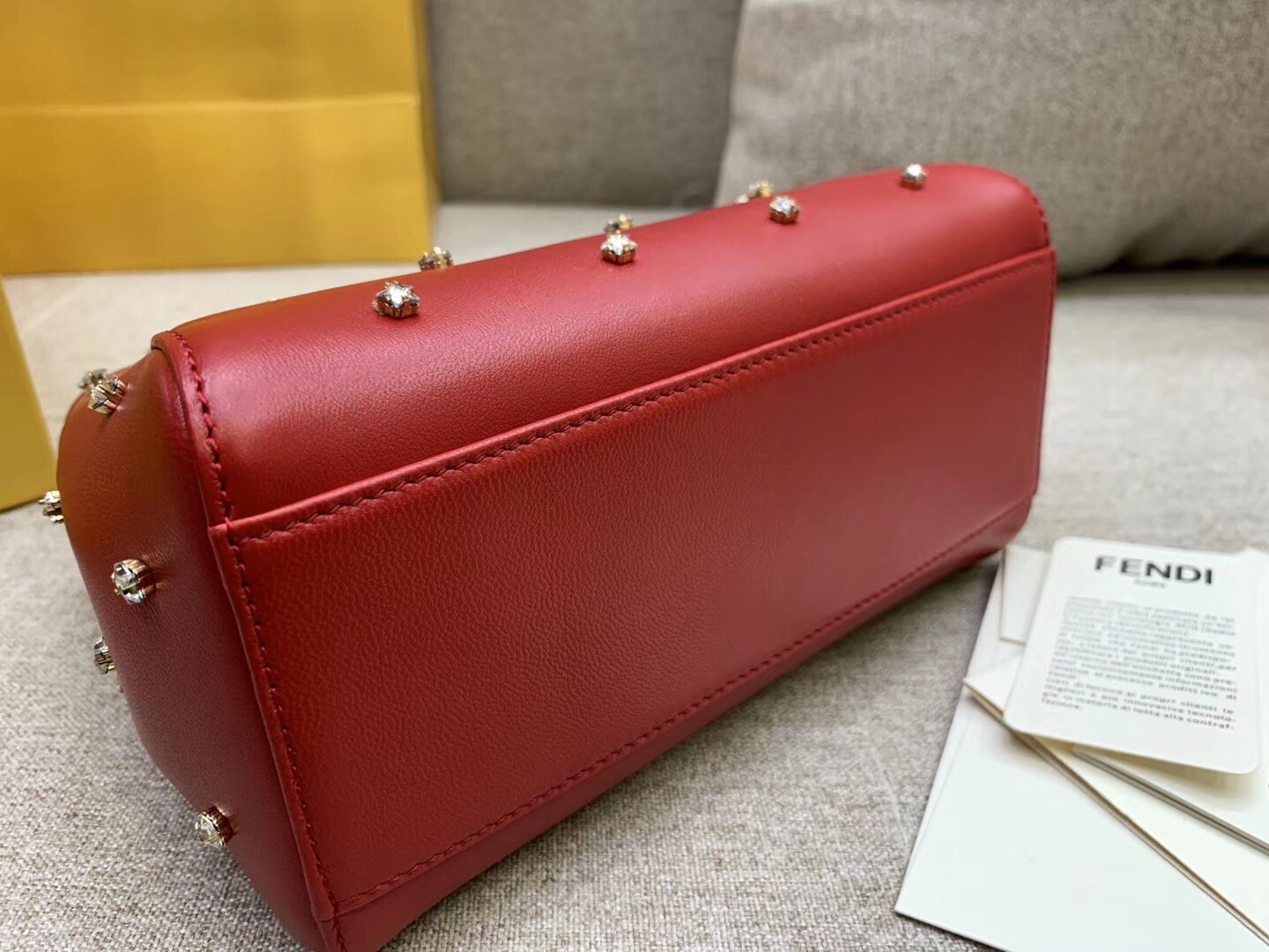 F**di peekaboo xs bag with star studs in red nappa leather