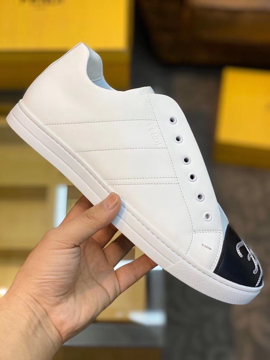F**di white slip-on sneakers with karligraphy motif