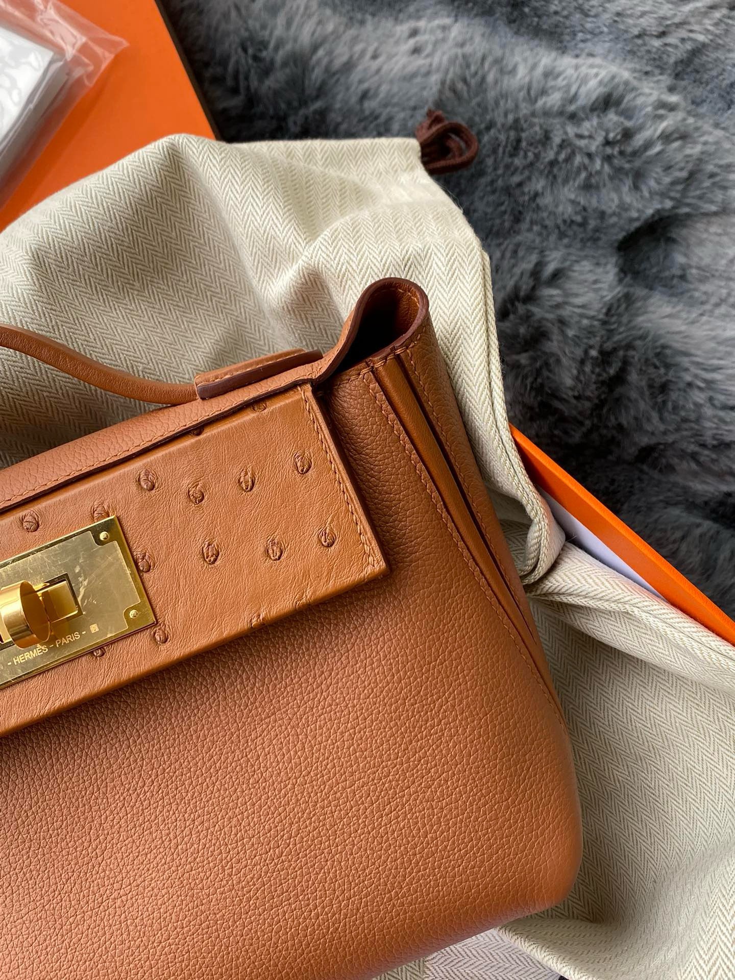 H**mes 24/24 mini 21 touch bag in gold evercolor and ostrich leather