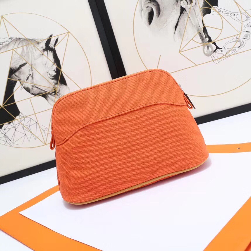 H**mes medium bolide travel case in orange cotton