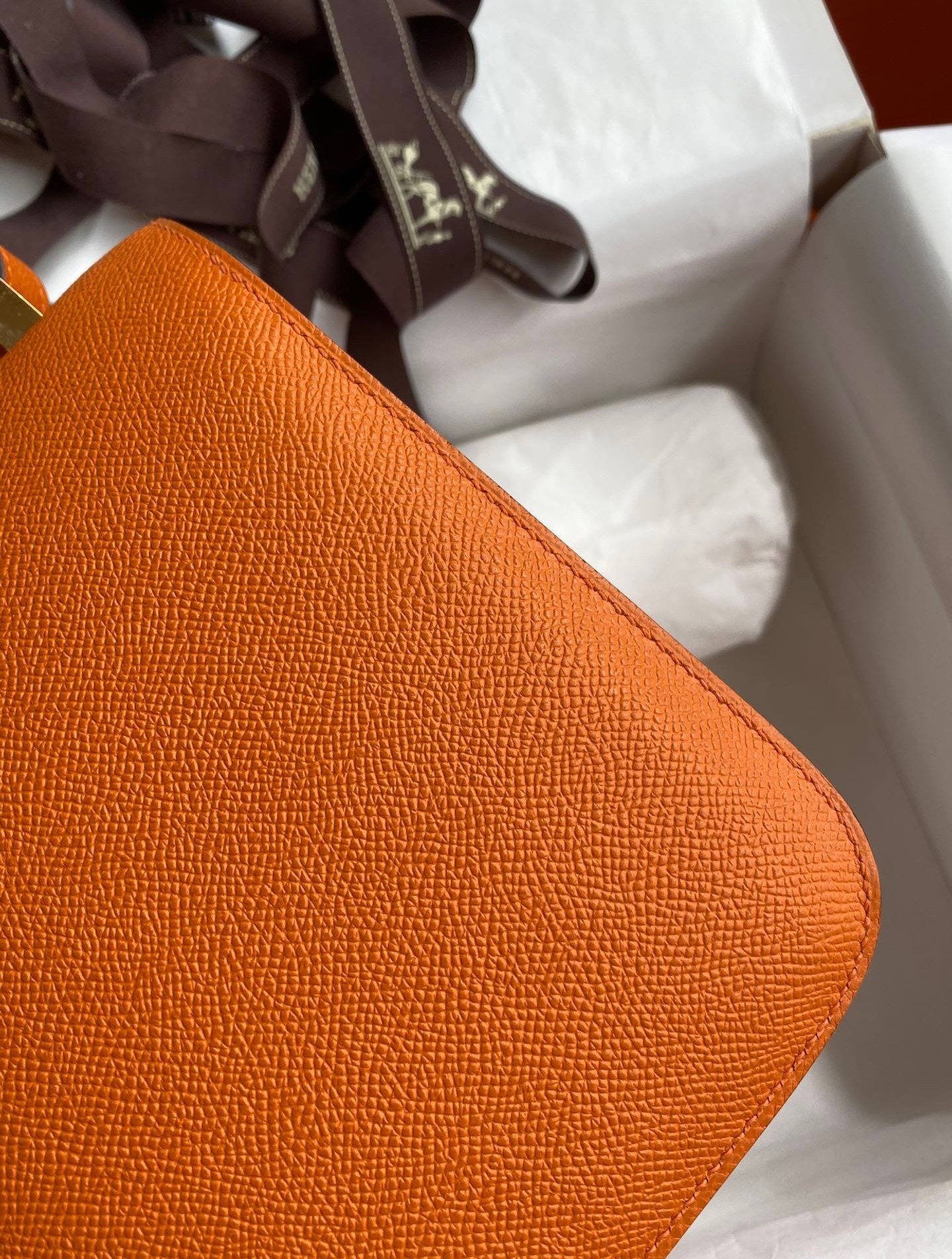 H**mes constance 24 handmade bag in orange epsom calfskin