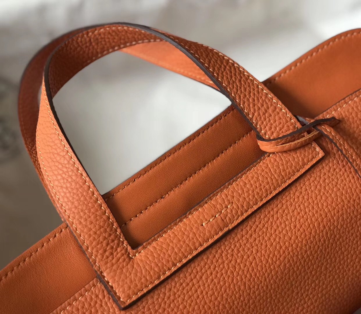 H**mes halzan 31cm bag in orange clemence leather