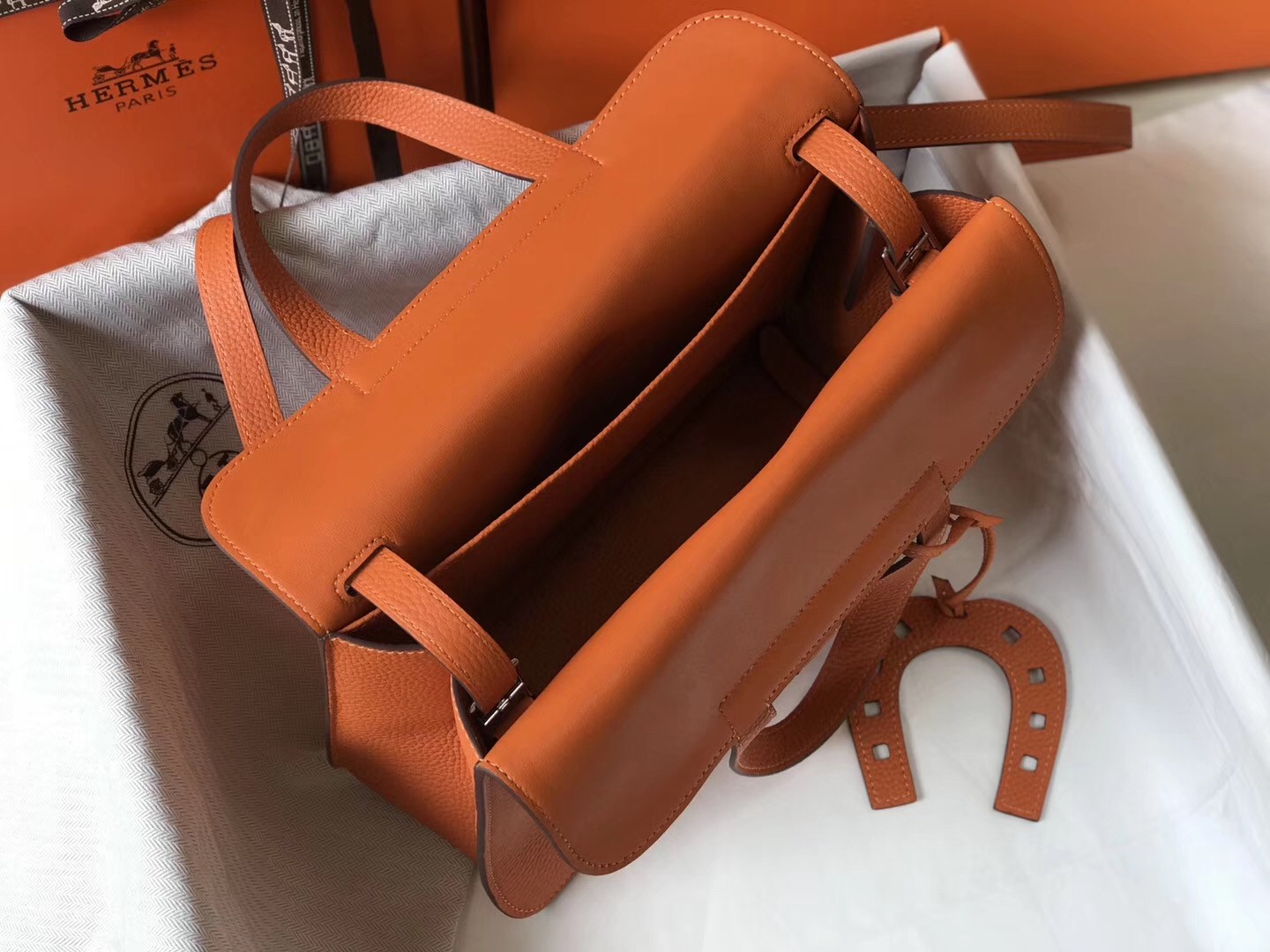 H**mes halzan 31cm bag in orange clemence leather