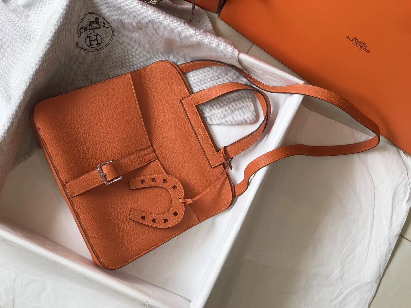 H**mes halzan 31cm bag in orange clemence leather