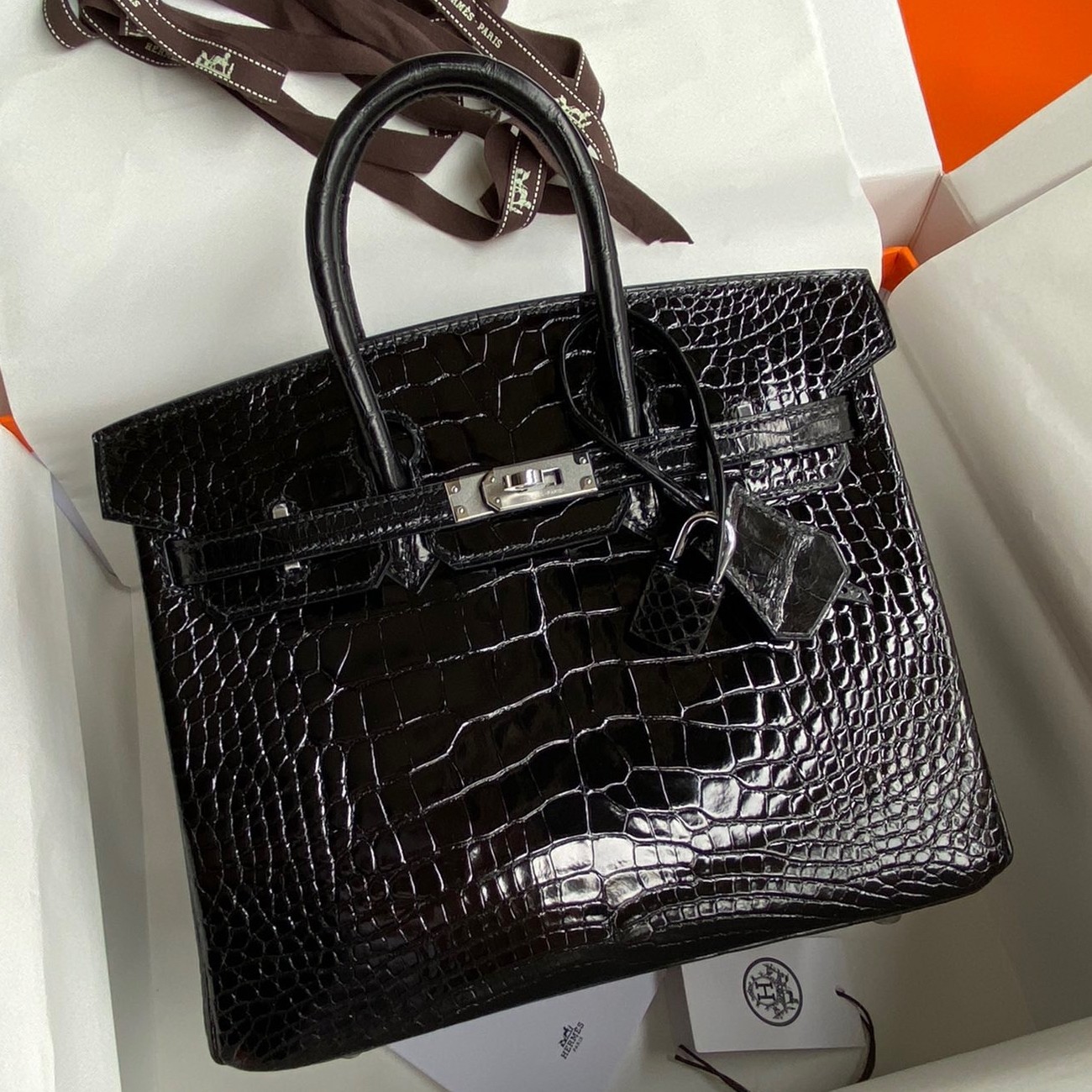 H**mes birkin 25 retourne handmade bag in black shiny alligator leather