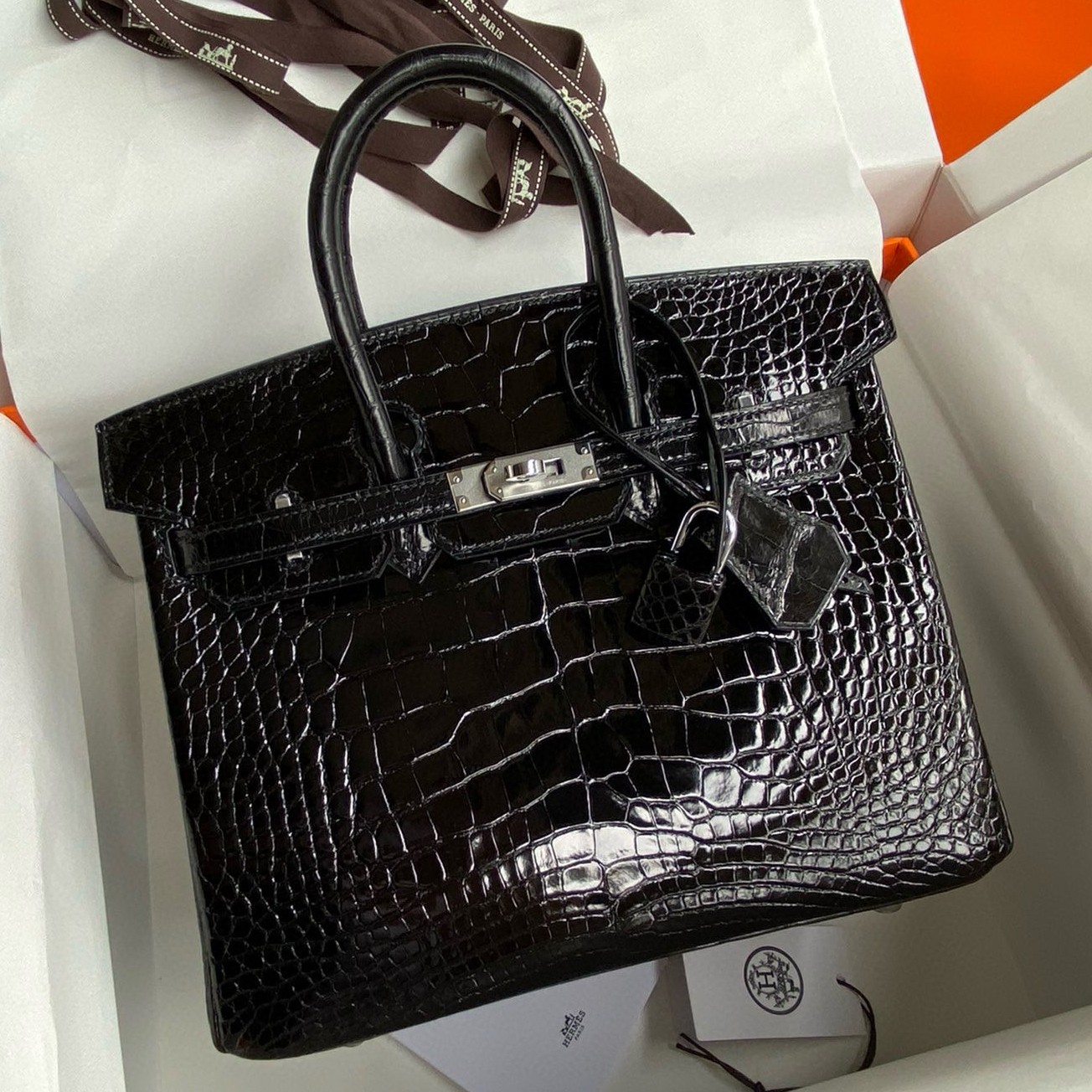 H**mes birkin 25 retourne handmade bag in black shiny alligator leather