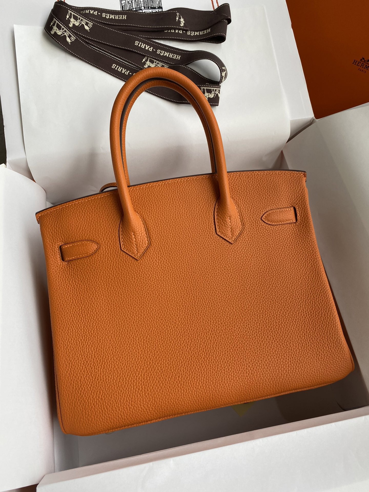 H**mes birkin 25 retourne handmade bag in orange clemence leather