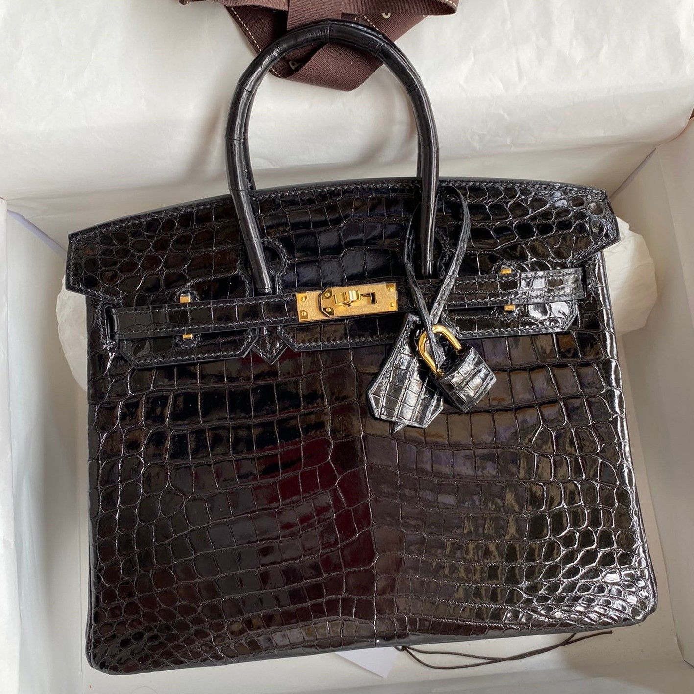 H**mes birkin 25 handmade bag in black crocodile niloticus shiny skin