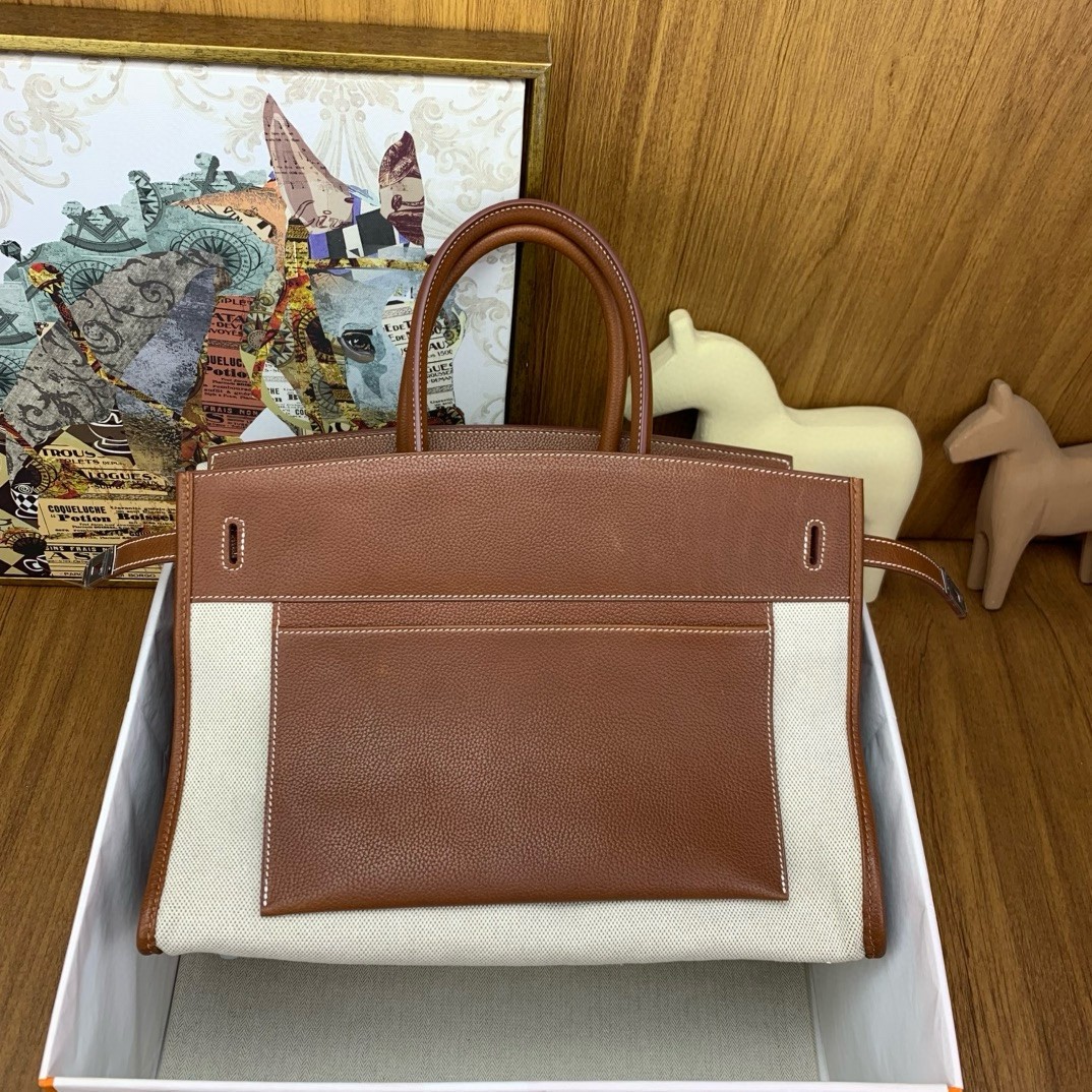 H**mes birkin à l’envers 35 bag in gold clemence leather and canvas