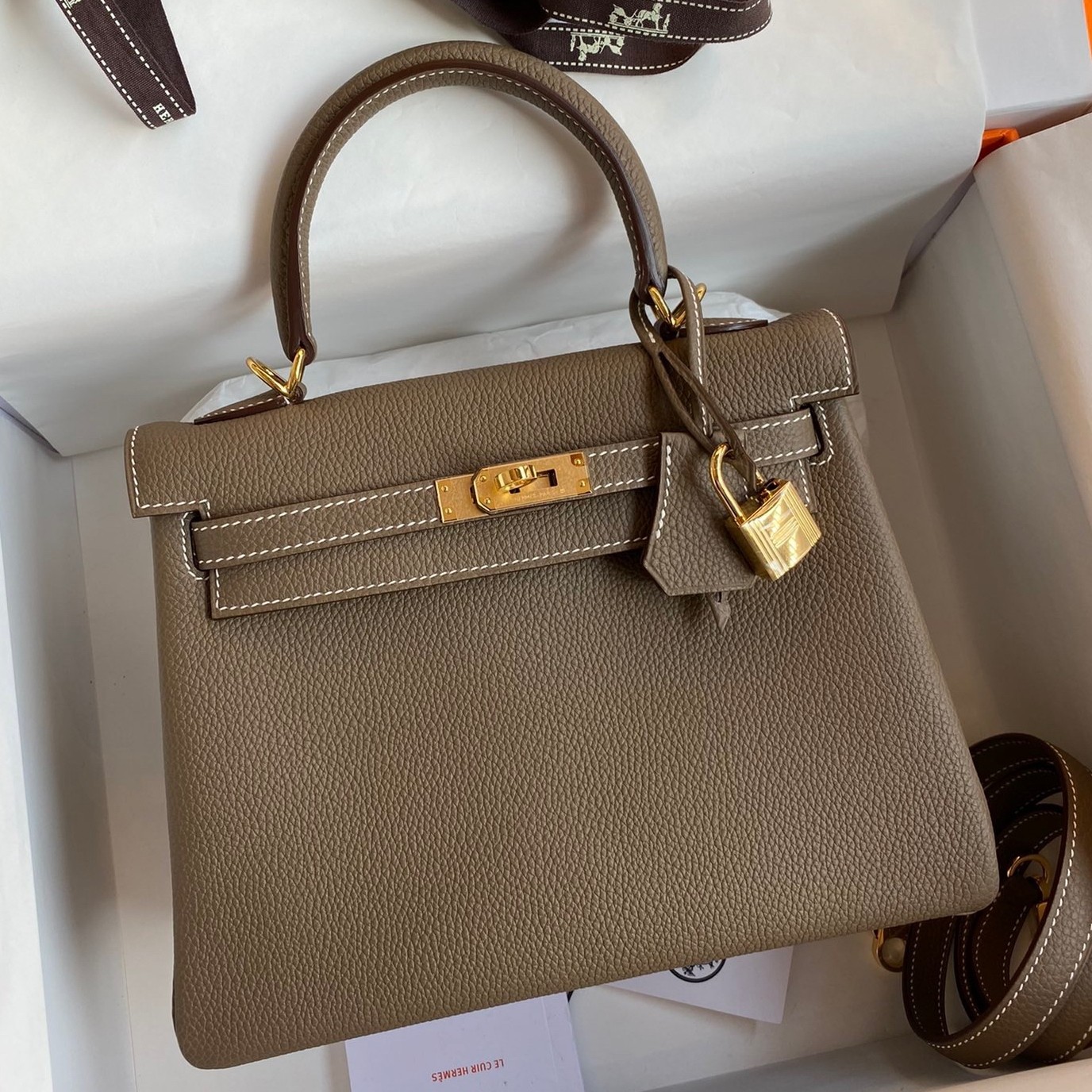 H**mes kelly retourne 25 handmade bag in taupe clemence leather