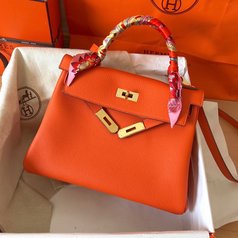 H**mes kelly retourne 28 handmade bag in orange clemence leather