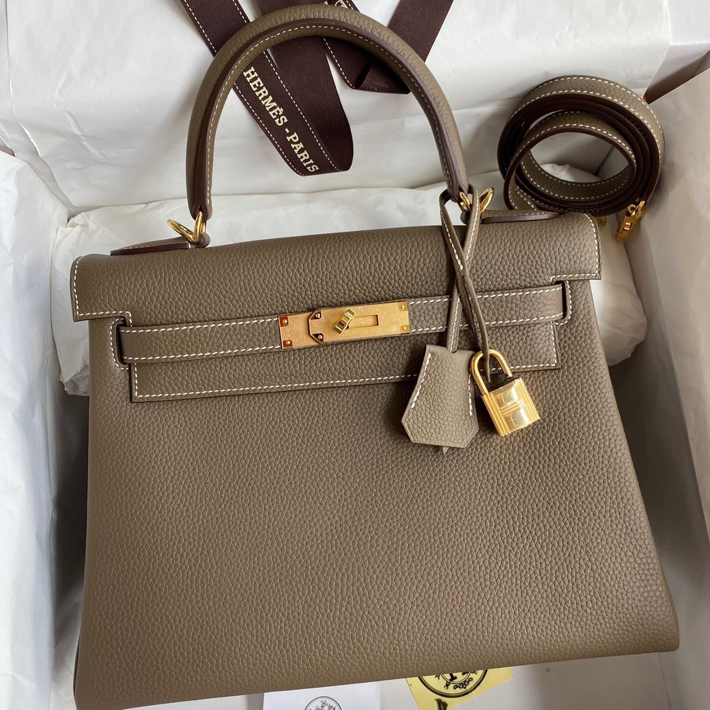 H**mes kelly retourne 28 handmade bag in taupe clemence leather