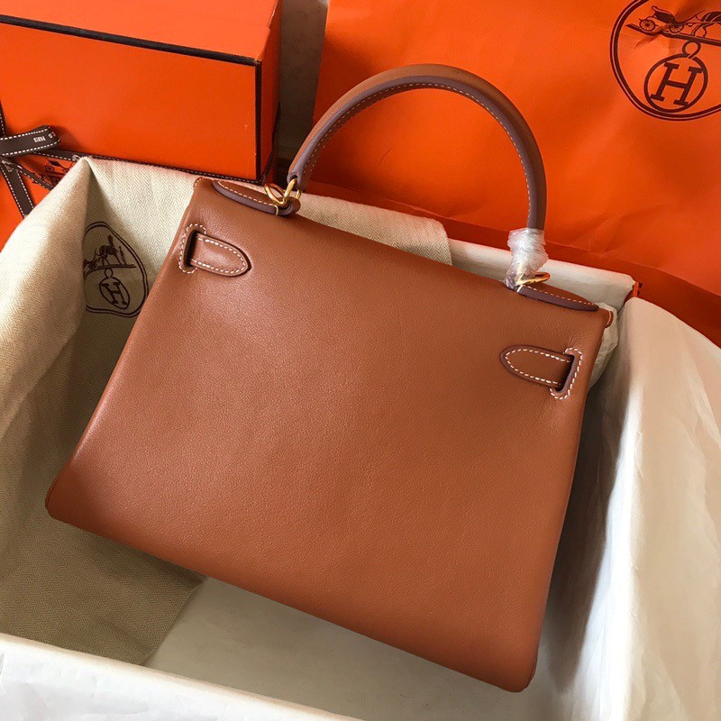 H**mes kelly retourne 28 handmade bag in gold swift calfskin