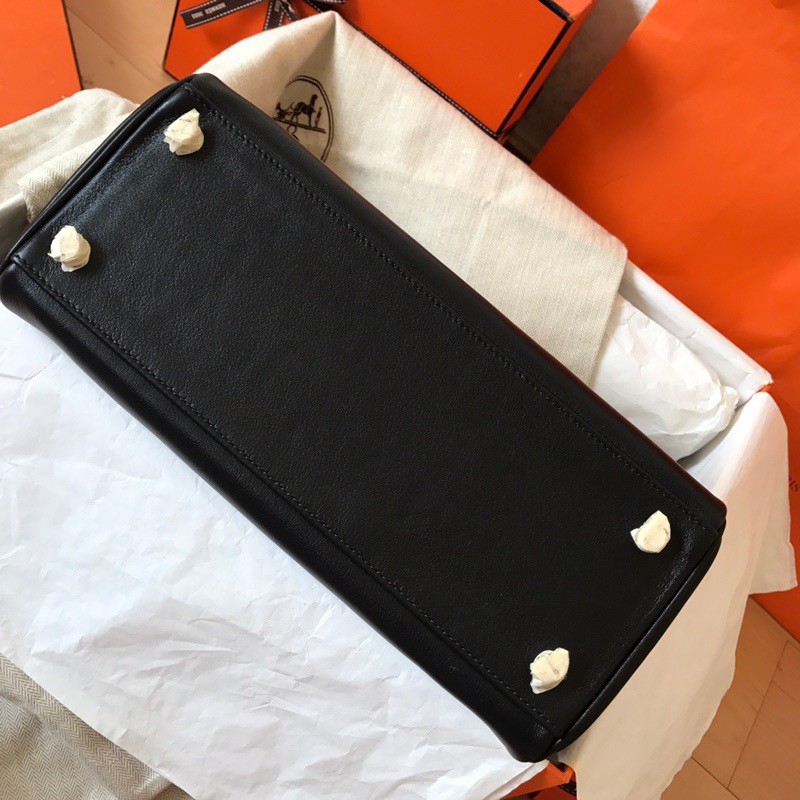 H**mes kelly retourne 28 handmade bag in black swift calfskin